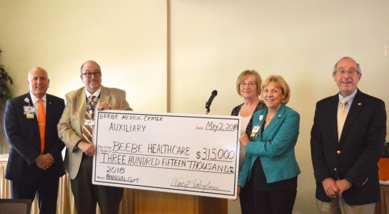 Celebrating the Beebe Auxiliary 2018 check presentation are (l-r) Tom Protack, Beebe Medical Foundation; Rick Schaffner, Beebe Healthcare executive vice president and chief operating officer; Nancy Tartaglione, Beebe Auxiliary outgoing president; Judy Aliquo, Beebe Medical Foundation president and CEO; and Dave Herbert, Beebe board of directors chair. SUBMITTED PHOTOS